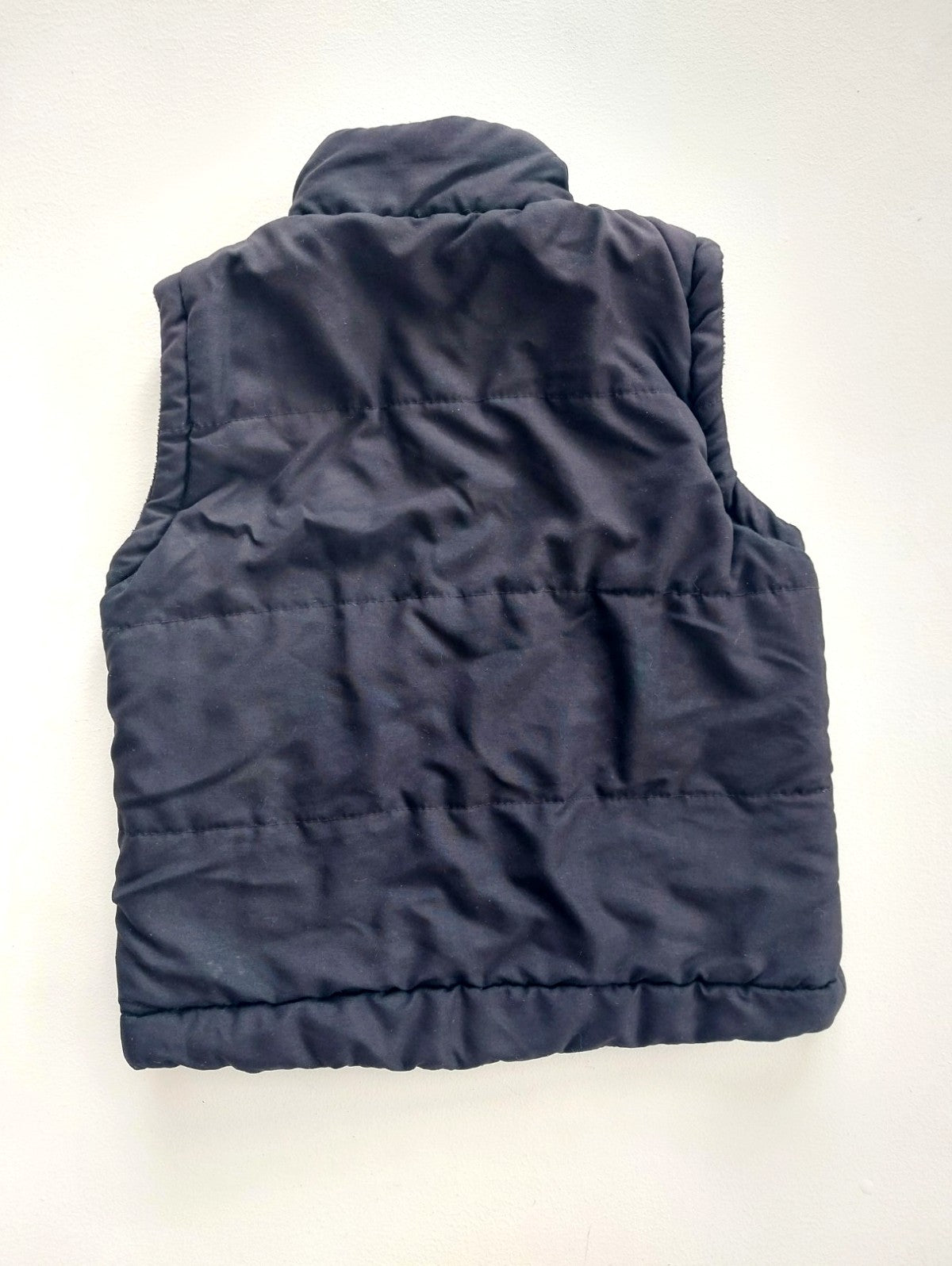 Black vest size 4