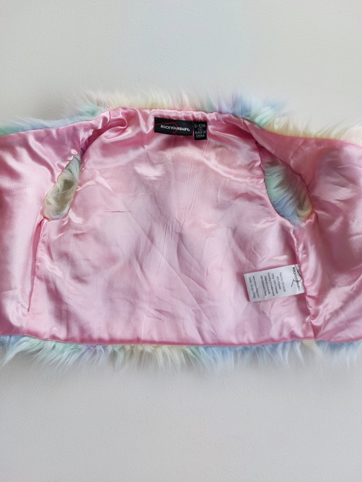 Rainbow fluffy vest 6-12 months