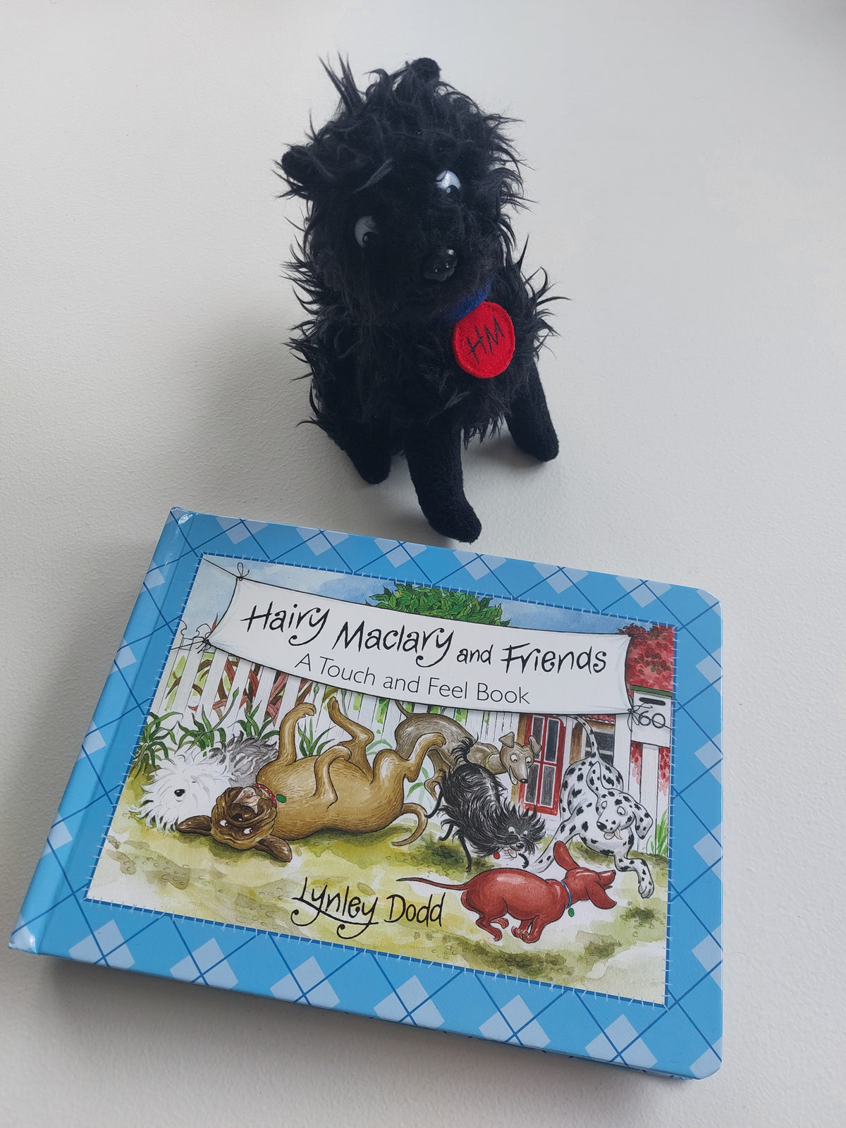 Hairy Maclary touch and feel book with soft toy - Lynley Dodd